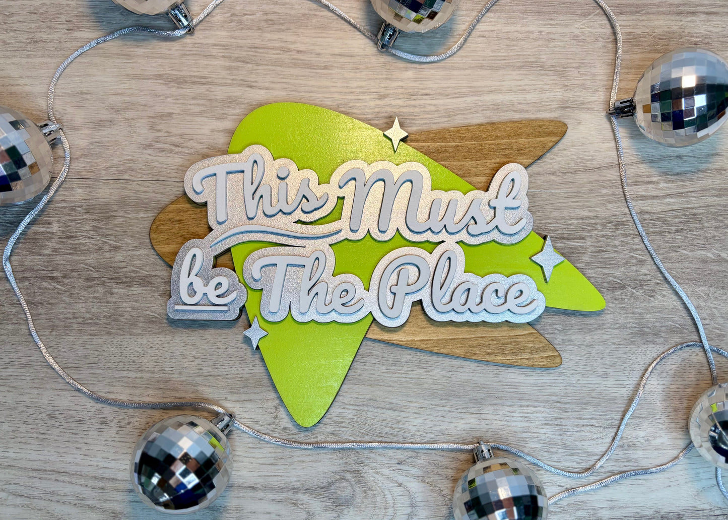 “This Must Be The Place” Boomerang Sign - Wall Decor